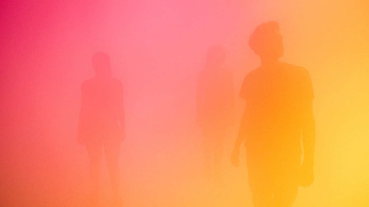 multiple colored image of silhouettes behind fog. 