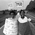 girls protesting on a road