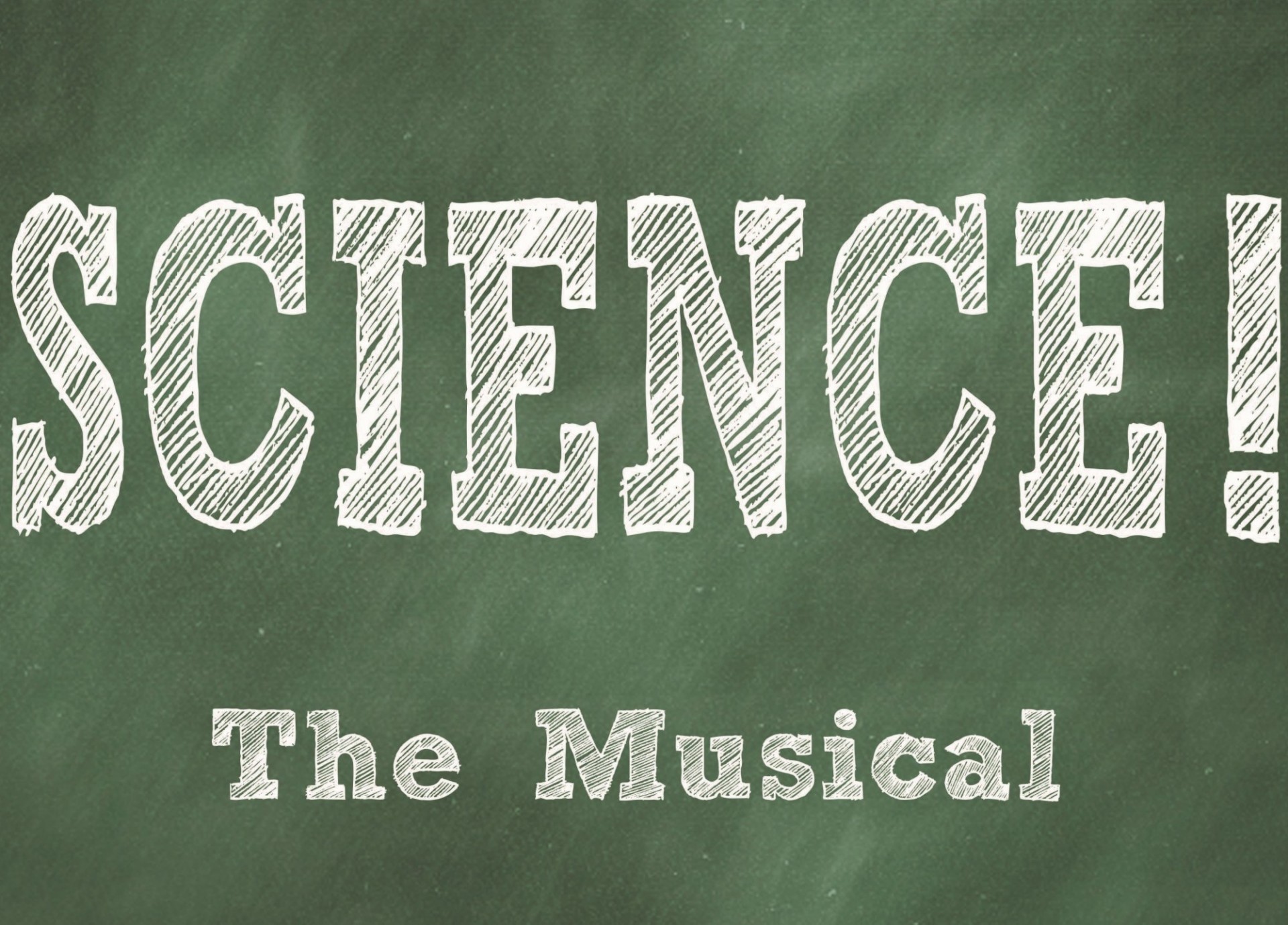 Writing on a chalk board that says science the musical