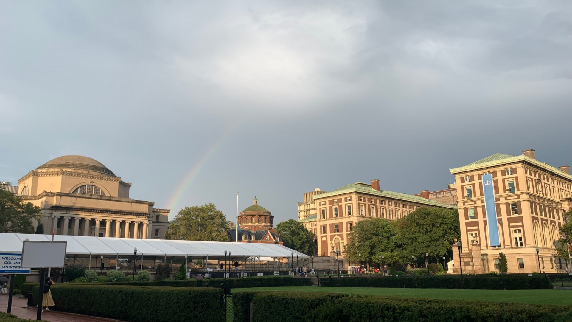 Columbia University campus, showing Low Library and College Walk, with a rainbow above. 