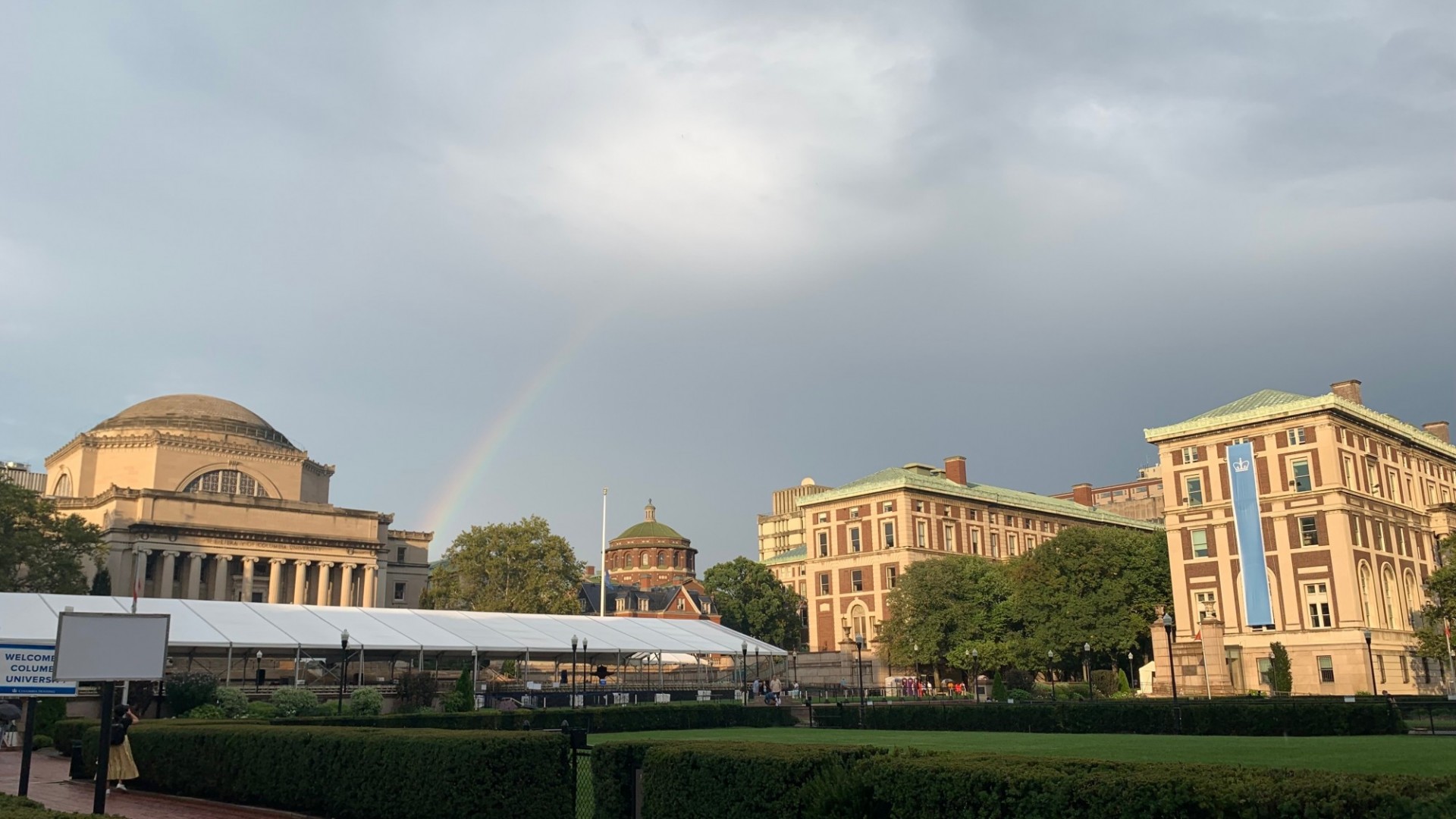 Image credit: Ariana Novo Columbia University campus, showing Low Library and College Walk, with a rainbow above.