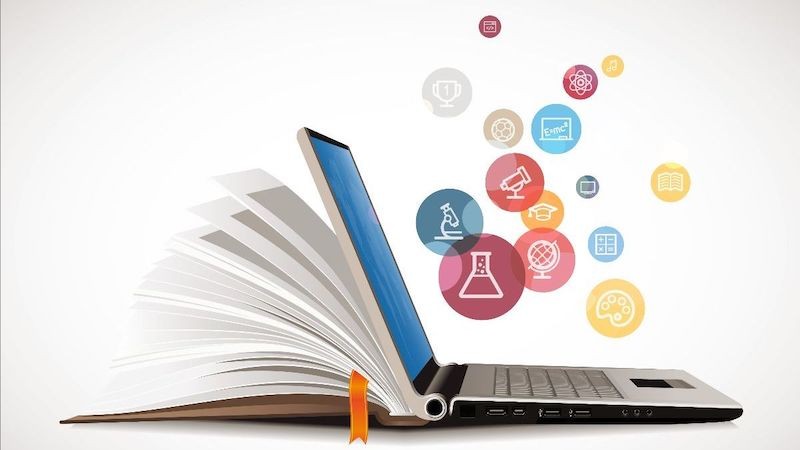 graphic of laptop with education bubbles.