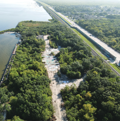 Aerial view of the 15-acre property known as Lincoln Beach. The land is bound by Lake Pontchartrain and Southern Railroad/Hayne Boulevard. (Source: Lincoln Beach Site Assessment Report, April 2021) Lincoln Beach