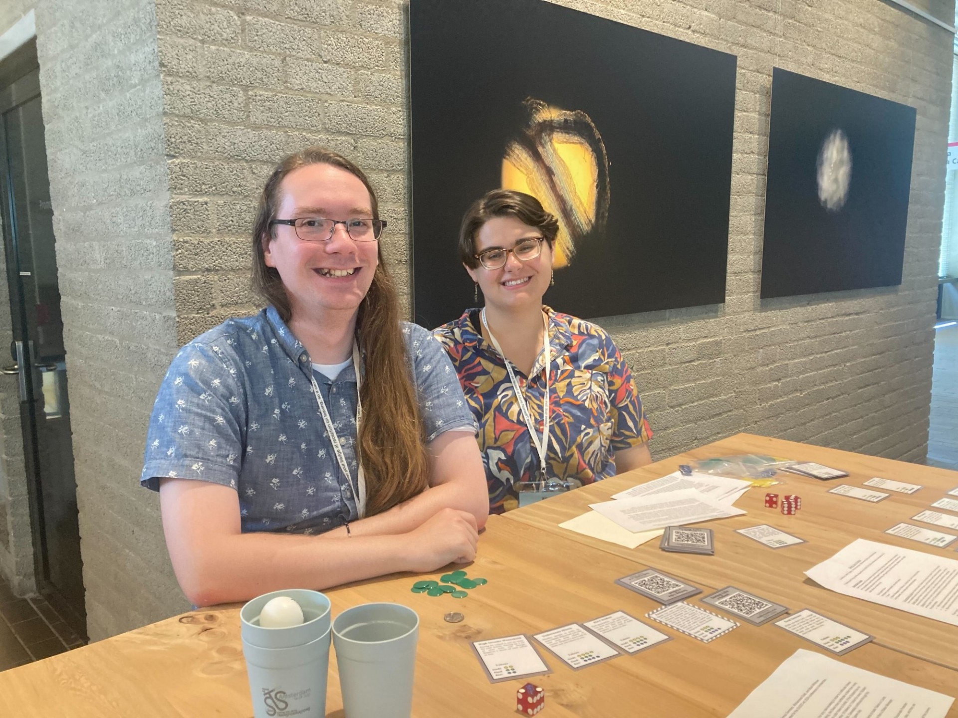 Griffin Fadellin and Emma Germano with the tabletop game