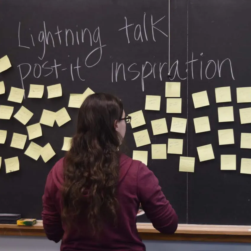 student with post-it notes