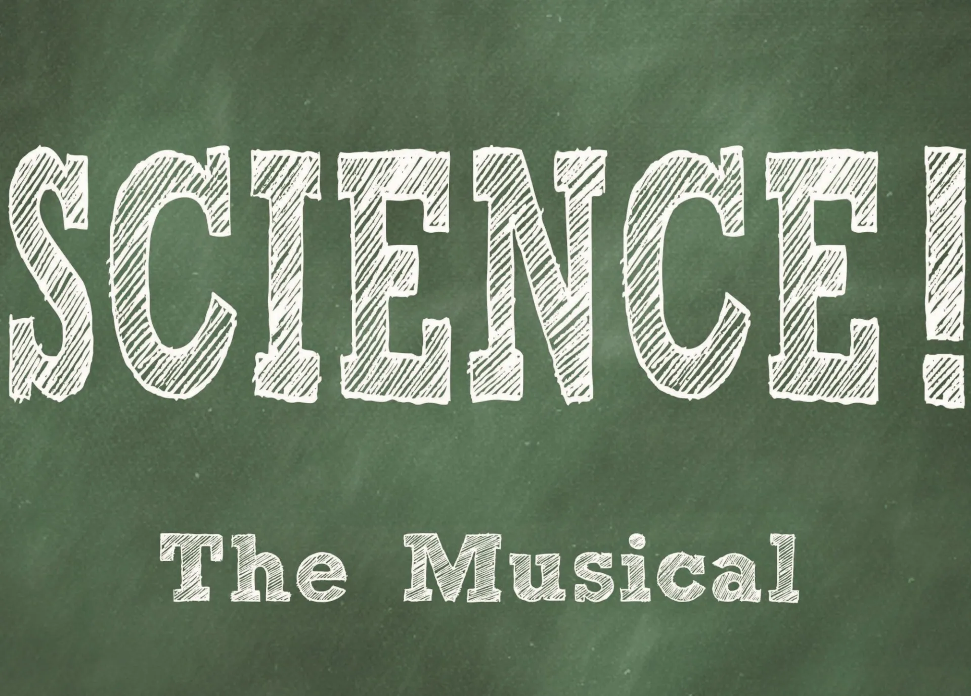 Writing on a chalk board that says science the musical